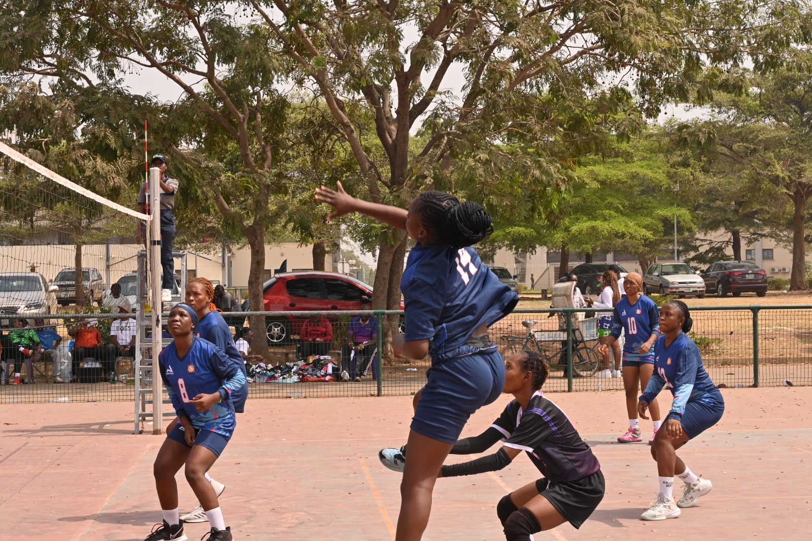 QATGVI volleyball players in action
